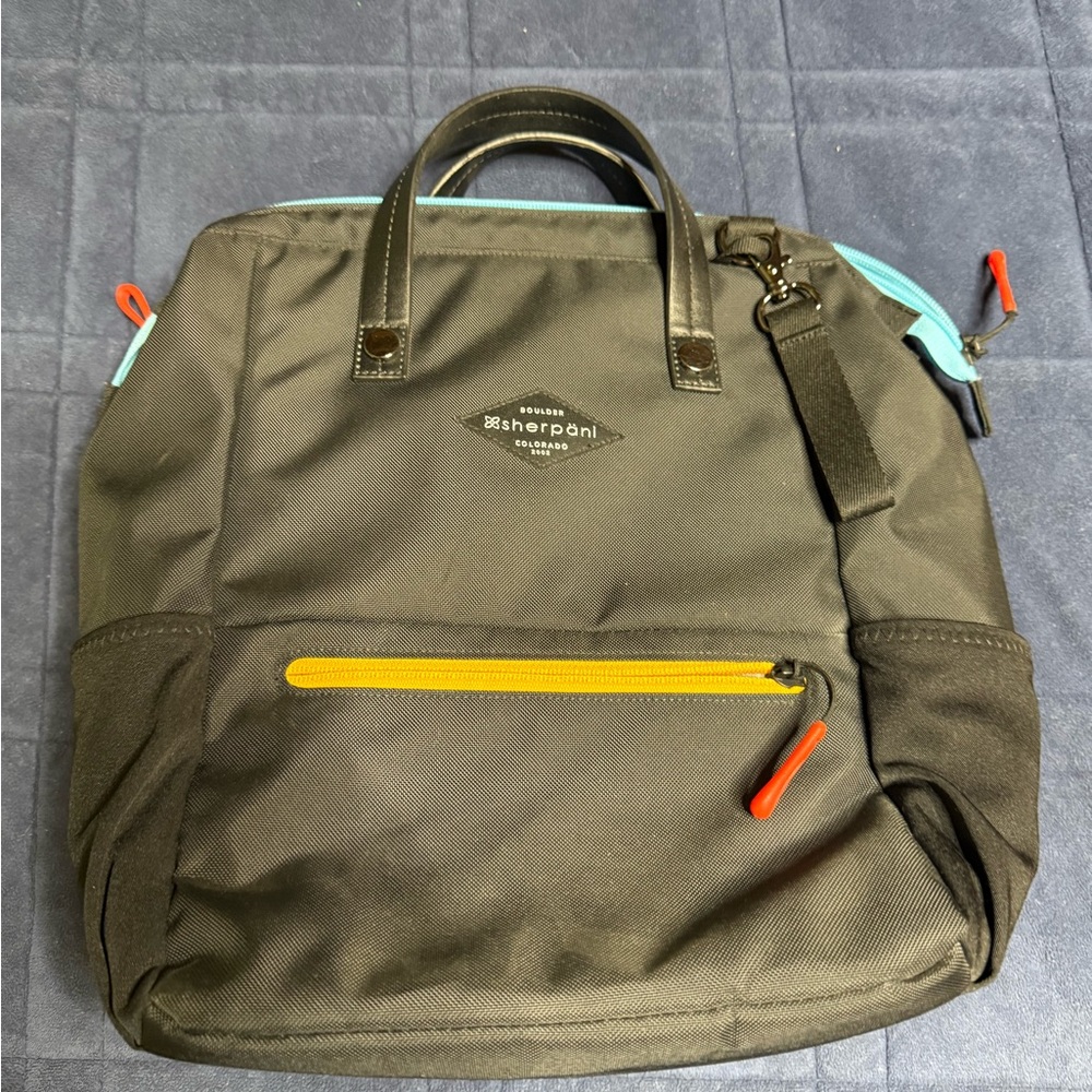 Sherpani Black and Yellow Backpack with Modern Design